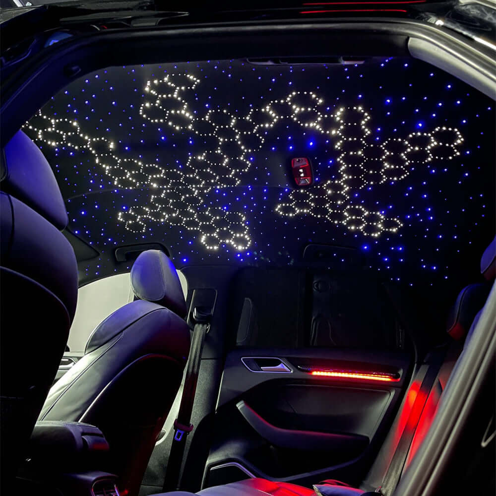 Interior view of car featuring starlight headliner kit with fiber optic lights